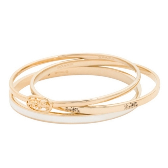 Coach Jewelry - 🔹️Coach🔹️ Horse and Carriage Gold and White Bangle Set